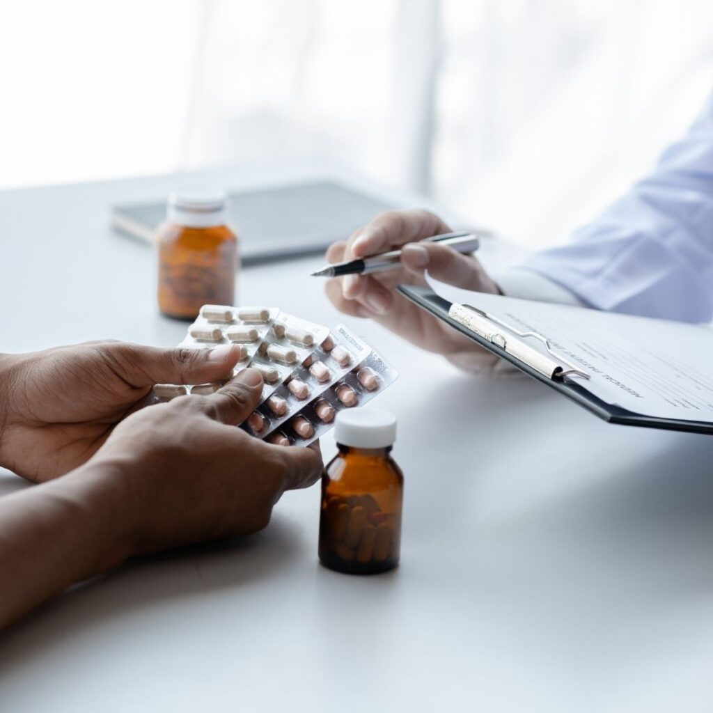 Doctor mentoring patient about medical assisting Treatment.