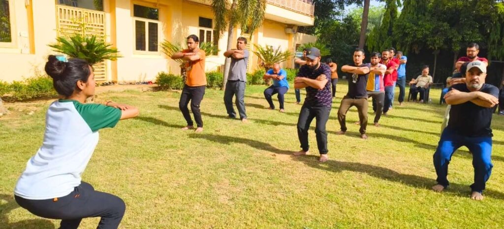 Substance Abuse addicts Practicing yoga at rehab centre