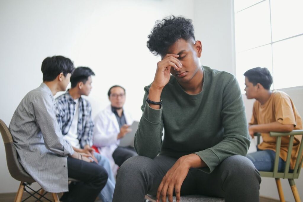 Group therapy session in rehab