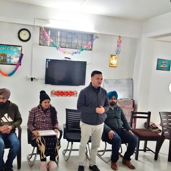Staff and a patient in a Detox therapy at a drug de-addiction centre in Chandigarh.