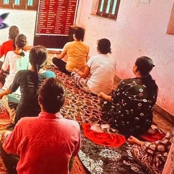 Women attending yoga sessions at rehab centre.