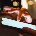 A person scrolling phone.