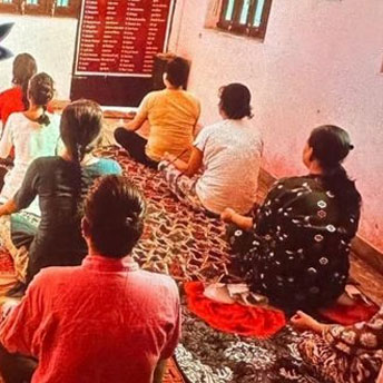 Women attending yoga sessions at rehab centre.